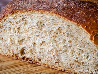Moist, airy crumb with flecks of whole wheat