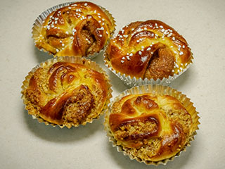 Delicious sweet rolls with nuts and pearl sugar